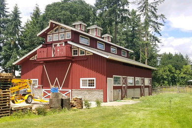 Inspiration for a huge rustic detached barn remodel in Portland