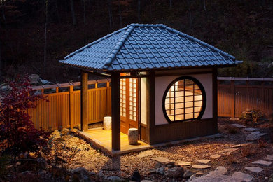 Inspiration for a small zen detached shed remodel in Other