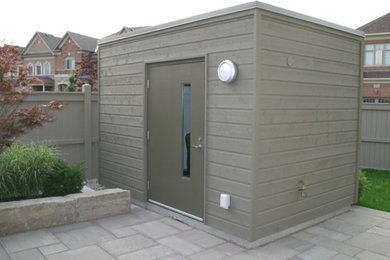 Design ideas for a medium sized contemporary detached garden shed in Toronto.