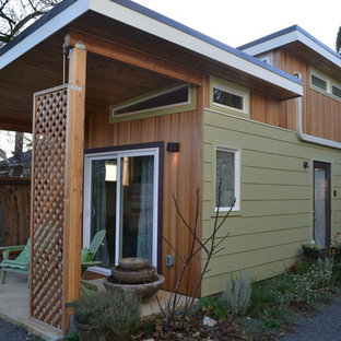 Example of a small trendy detached guesthouse design in Portland