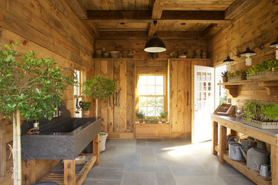 Inspiration for a rustic garden shed remodel in New York