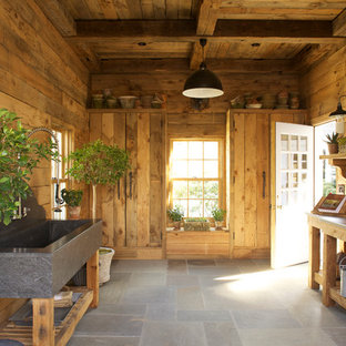 Inspiration for a rustic garden shed remodel in New York