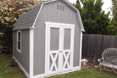 This is an example of a medium sized detached garden shed in Austin.
