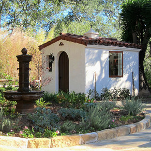 Small mediterranean detached garden shed in Santa Barbara.
