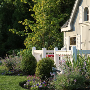 Photo of a mid-sized traditional detached garden shed in New York.