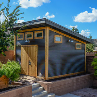 This is an example of a mid-sized transitional detached garden shed in Orange County.