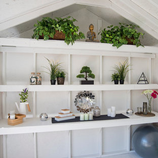This is an example of a mid-sized shabby-chic style detached studio in Detroit.