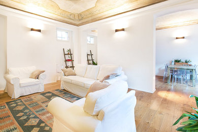 Example of a trendy family room design in Turin
