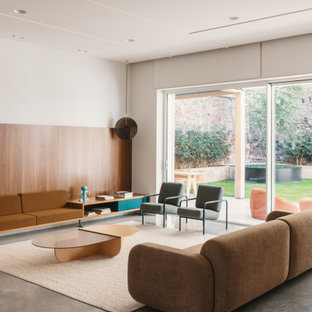 Ispirazione per un grande soggiorno contemporaneo aperto con sala formale, pareti bianche, nessuna TV e pavimento grigio