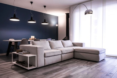 Living room - modern living room idea in Florence