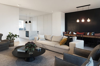 Foto di un ampio soggiorno design con pavimento in laminato e pavimento grigio