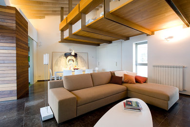 Esempio di un grande soggiorno minimal aperto con pareti bianche