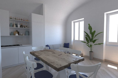 Immagine di un soggiorno mediterraneo di medie dimensioni e aperto con pareti bianche, parquet chiaro, nessun camino, TV a parete e pavimento beige