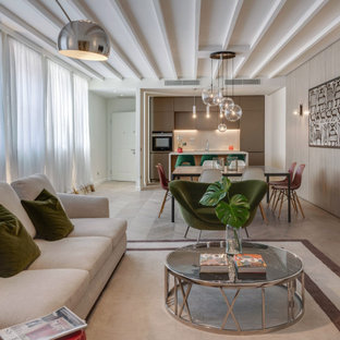 Immagine di un grande soggiorno contemporaneo aperto con pareti bianche, parquet chiaro e pavimento beige