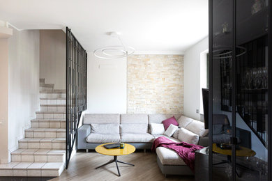 Immagine di un soggiorno minimalista di medie dimensioni e aperto