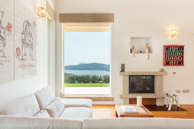Mediterranean Living Room by Pitzus Group | Stilisti del mattone
