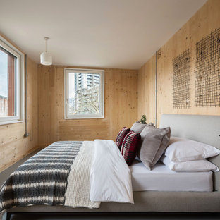 Inredning av ett nordiskt mellanstort gästrum, med beige väggar, grått golv och linoleumgolv