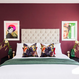 Inspiration for a contemporary bedroom in London with red walls, carpet and grey floors.