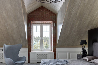На фото: хозяйская спальня в современном стиле с ковровым покрытием и серым полом