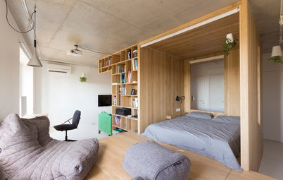 Houzz тур: Спальня в кубе и бетонный потолок для айтишника