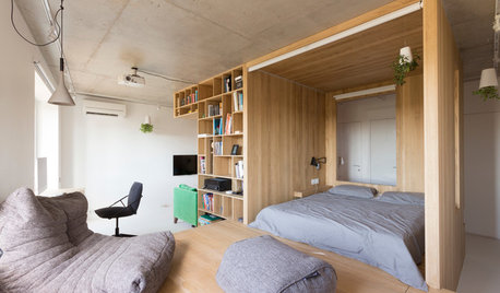 Houzz тур: Спальня в кубе и бетонный потолок для айтишника