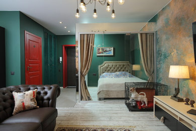 Foto de dormitorio ecléctico con paredes verdes