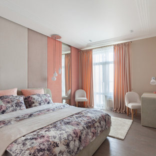 Ejemplo de dormitorio contemporáneo con suelo de corcho