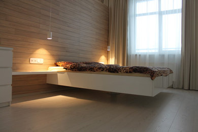 Идея дизайна: спальня в современном стиле с кроватью в нише