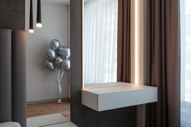 This is an example of a medium sized contemporary master bedroom in Saint Petersburg.