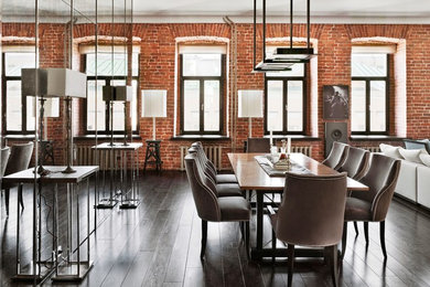 Photo of a large urban enclosed dining room in Copenhagen with dark hardwood flooring, no fireplace and metallic walls.