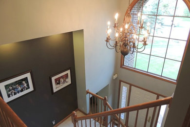 Elegant staircase photo in Grand Rapids