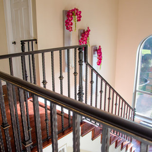 Inspiration for a mediterranean wooden l-shaped staircase remodel in Dallas with wooden risers