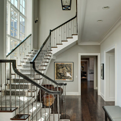 Inspiration for a timeless wooden staircase remodel in Chicago with painted risers