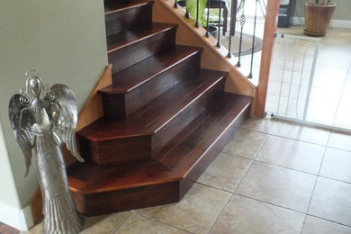 Staircase - mid-sized transitional wooden straight staircase idea in Sacramento with wooden risers