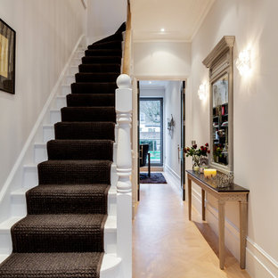 Small ornate wooden l-shaped staircase photo in London with wooden risers
