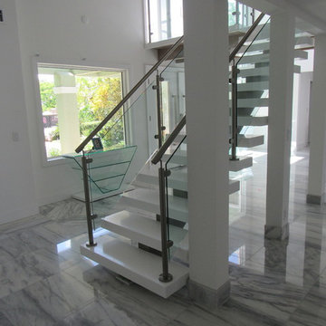 Aker Res Remodel. Glass, Steel and Pure White Treads