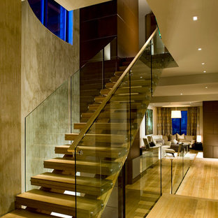 Example of an asian staircase design in Denver