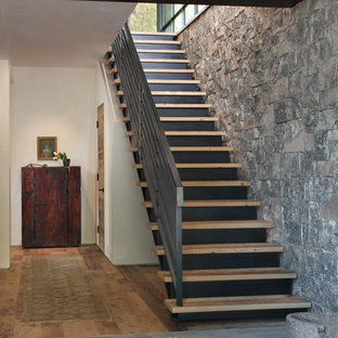 Inspiration for a rustic staircase remodel in Other