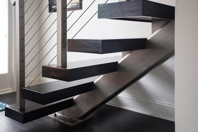 Inspiration for a mid-sized modern wooden straight open staircase remodel in Houston