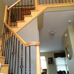 Example of a classic wooden l-shaped staircase design in Chicago with wooden risers