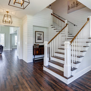 Inspiration for a transitional wooden l-shaped staircase remodel in Atlanta with painted risers