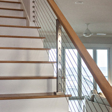 Beach home remodel cable railing