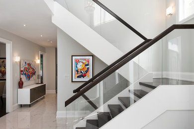 Transitional staircase photo in Toronto
