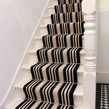 Black and white striped stair carpet runner