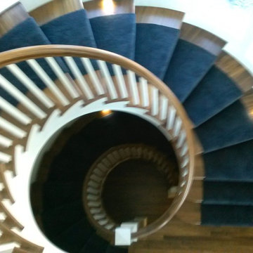 Blue Velvet Stair Runner on Curved Staircase