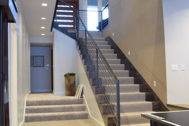 Mid-sized trendy carpeted straight cable railing staircase photo in Salt Lake City with wooden risers