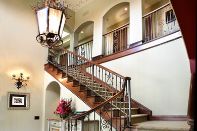 Staircase - large mediterranean wooden l-shaped staircase idea in Los Angeles with wooden risers