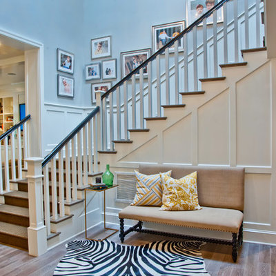 Elegant wooden staircase photo in Los Angeles