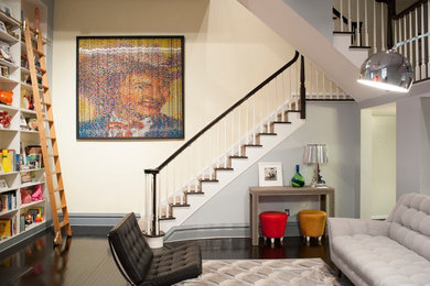 Design ideas for a large eclectic carpeted straight staircase in New York with carpeted risers.