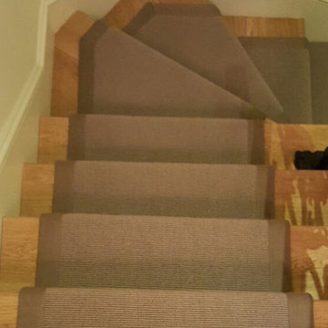 Brown Carpet Runner With Border to Stairs